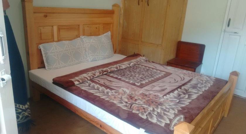 jagran-resort-kutton-colony-swiss-cottage-master-bed-room
